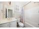 Bright bathroom with a shower-tub combo and a vanity at 130 Brookridge Ct, Fayetteville, GA 30215