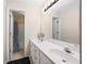 Bathroom with a double sink vanity and a door to the shower and toilet at 130 Brookridge Ct, Fayetteville, GA 30215