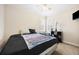 Neutral bedroom with a ceiling fan and natural light at 130 Brookridge Ct, Fayetteville, GA 30215