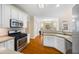 Charming kitchen area with stainless appliances, a gas range, and an adjacent dining area at 130 Brookridge Ct, Fayetteville, GA 30215