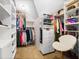 Spacious walk-in closet with custom shelving and ample storage space for clothes and accessories at 130 Brookridge Ct, Fayetteville, GA 30215