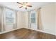 Bright and airy bedroom with hardwood floors and two windows at 2184 Clairmont Ne Ter, Atlanta, GA 30345