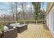 Wooden deck with metal railing and outdoor seating at 2184 Clairmont Ne Ter, Atlanta, GA 30345