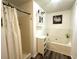 Relaxing bathroom featuring a jacuzzi style tub and a separate shower at 525 S Lost Lake Cv, Villa Rica, GA 30180