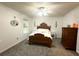 Spacious bedroom featuring a large bed, ceiling fan, and closet at 525 S Lost Lake Cv, Villa Rica, GA 30180