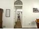 Hallway leading to bedroom with neutral wall colors and wood floors at 525 S Lost Lake Cv, Villa Rica, GA 30180