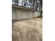 Spacious two car garage with bonus storage shed in rear at 6716 Browns Mill Rd, Lithonia, GA 30038