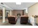 Finished basement with a brick fireplace and comfortable seating area at 270 Cochran Ridge Rd, Dallas, GA 30157