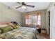 Cozy bedroom featuring plush bedding, a bright window, and closet at 270 Cochran Ridge Rd, Dallas, GA 30157