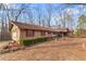 Charming brick ranch-style home with a well-maintained front yard and attached garage at 270 Cochran Ridge Rd, Dallas, GA 30157