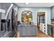 Open kitchen layout with stainless steel appliances and modern cabinets at 270 Cochran Ridge Rd, Dallas, GA 30157
