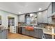 Cozy kitchen featuring stainless steel appliances, custom cabinets, and copper farmhouse sink at 270 Cochran Ridge Rd, Dallas, GA 30157