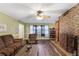 Inviting living room with fireplace, plush seating, and wood floors at 270 Cochran Ridge Rd, Dallas, GA 30157