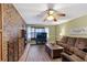 Inviting living room with fireplace, plush seating, and wood floors at 270 Cochran Ridge Rd, Dallas, GA 30157