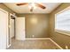 This bedroom features neutral walls, carpet floors, and two white doors at 285 Argus Nw Cir, Atlanta, GA 30331