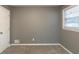 Bedroom features soft carpeting and neutral paint at 3111 Flat Shoals Rd, Decatur, GA 30034