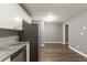 Updated kitchen with stainless steel appliances and modern flooring at 3111 Flat Shoals Rd, Decatur, GA 30034