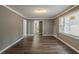Spacious living room featuring hardwood floors and abundant natural light at 3111 Flat Shoals Rd, Decatur, GA 30034