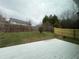 Large, fenced backyard with a spacious deck, perfect for entertaining at 4976 Notting Glen Ln, Snellville, GA 30039