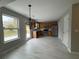 Eat-in kitchen with stainless appliances, wood cabinets, and a backyard view at 4976 Notting Glen Ln, Snellville, GA 30039