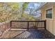 A lovely back porch overlooking a natural wooded area at 2958 Flat Shoals Rd, Decatur, GA 30034