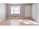 Inviting living room with a bay window, natural light, and closet at 2958 Flat Shoals Rd, Decatur, GA 30034