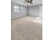 Spacious bedroom featuring a ceiling fan and a window with natural light at 3260 Henderson Mill Rd # A, Atlanta, GA 30341