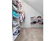 Angled walk-in closet providing ample storage shelves and hanging racks at 3260 Henderson Mill Rd # A, Atlanta, GA 30341