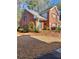 Charming brick townhouse with meticulously landscaped front yard and attractive front entry at 3260 Henderson Mill Rd # A, Atlanta, GA 30341