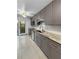 Updated kitchen featuring gray cabinets, granite countertops, and stainless steel appliances at 3260 Henderson Mill Rd # A, Atlanta, GA 30341