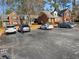 Exterior of townhomes with ample parking, providing a convenient and community-oriented living environment at 3260 Henderson Mill Rd # A, Atlanta, GA 30341