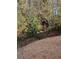 An expansive lawn borders a wooded area, providing privacy and a natural backdrop at 3260 Henderson Mill Rd # A, Atlanta, GA 30341