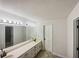 Bright bathroom with dual sinks, vanity, and plenty of counter space at 180 Antebellum Way, Fayetteville, GA 30215