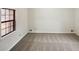 Empty bedroom with large windows and neutral carpet at 180 Antebellum Way, Fayetteville, GA 30215
