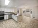 Spacious kitchen with stainless steel appliances, granite countertops, and a breakfast nook at 180 Antebellum Way, Fayetteville, GA 30215