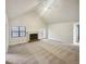 Bright living room featuring vaulted ceilings, fireplace, and neutral color palette at 180 Antebellum Way, Fayetteville, GA 30215