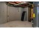 Unfinished basement with concrete walls and ceiling with exposed beams and a hot water heater at 3258 Bransley Way, Duluth, GA 30097