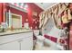 Cozy bathroom with modern fixtures, granite vanity top, and decorative shower curtain creating a relaxing atmosphere at 854 Malvern Blvd, Stone Mountain, GA 30087