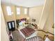 Spacious foyer with hardwood floors, double front doors, and a view of the living room from the staircase at 854 Malvern Blvd, Stone Mountain, GA 30087