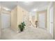 Upstairs hallway with carpeted floor, neutral paint, and a view of the stairs at 854 Malvern Blvd, Stone Mountain, GA 30087