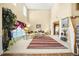 Bright open-concept living room with soaring ceilings and a view of the staircase at 854 Malvern Blvd, Stone Mountain, GA 30087