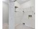 Laundry room with wire shelving and tile flooring at 1160 Windsor Pkwy # 13, Atlanta, GA 30319