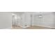 Open-concept living area showcases wood floors, neutral walls, and modern lighting creating a bright and airy space at 1160 Windsor Pkwy # 13, Atlanta, GA 30319