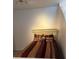 Cozy bedroom featuring a comfortable bed with decorative pillows and a ceiling light at 361 17Th Nw St # 2308, Atlanta, GA 30363