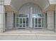 Building entrance with a modern arch and large glass doors numbered 361 at 361 17Th Nw St # 2308, Atlanta, GA 30363