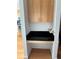 A kitchen nook features a black counter and under cabinet storage at 361 17Th Nw St # 2308, Atlanta, GA 30363