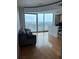 Spacious living room featuring a large window and city views at 361 17Th Nw St # 2308, Atlanta, GA 30363