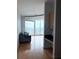 Apartment living room with floor to ceiling windows and a cityscape view at 361 17Th Nw St # 2308, Atlanta, GA 30363