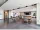Resident lounge area featuring tables, chairs, a kitchen area, and a TV at 361 17Th Nw St # 2308, Atlanta, GA 30363