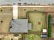 Aerial view of home at 600 Lockerbie Terrace showcasing spacious yard and storage building at 600 Lockerbie Ter, Mcdonough, GA 30252